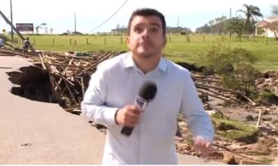 Reporter da Globo por pouco nao e atingido por poste