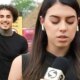 MC Livinho ri e danca atras de reporter durante cobertura