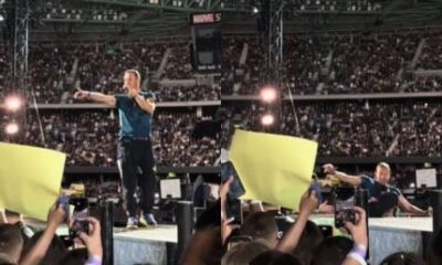 Chris Martin cai durante show do Coldplay e assusta os fãs