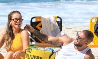 Paolla Oliveira e Diogo Nogueira aproveitam calorao e curtem praia
