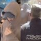 Pique e Clara Chia sao escoltados pela policia apos tumulto