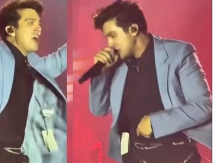 Quem nunca Luan Santana esquece etiqueta na roupa durante show