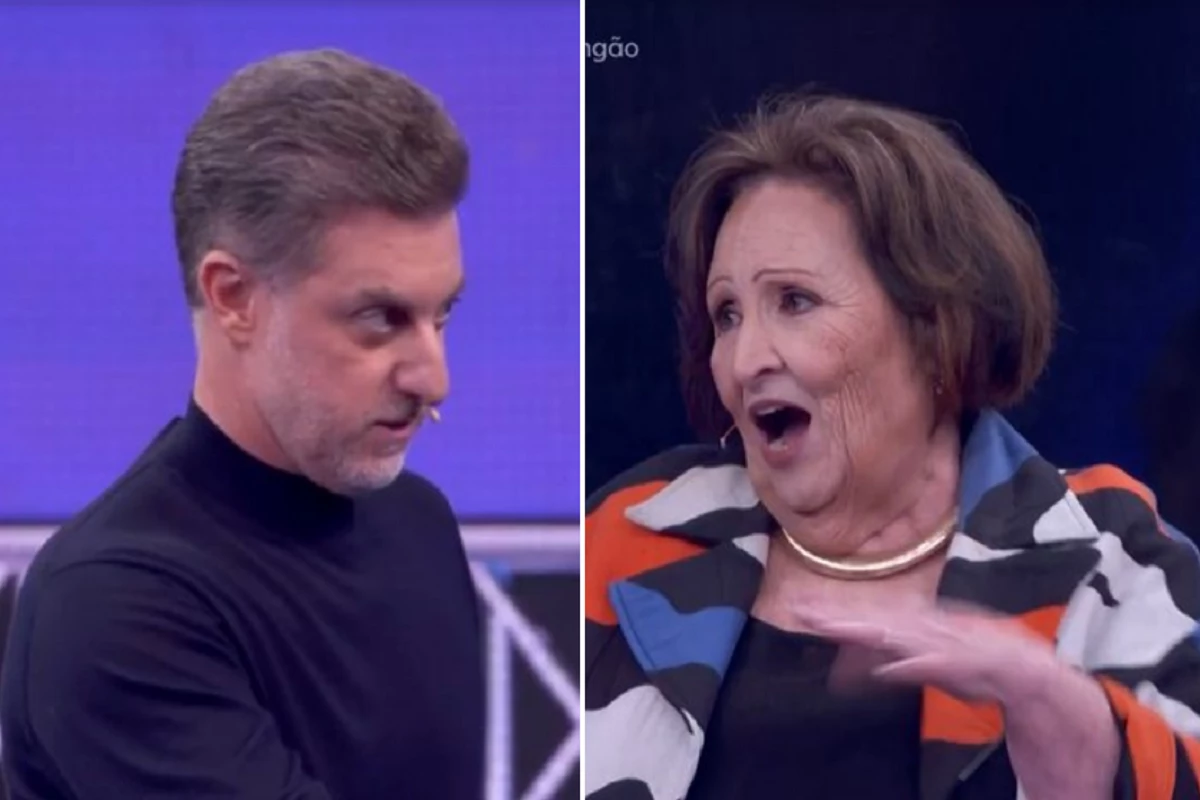 Luciano Huck leva alfinetada de Dea Lucia ao vivo apos