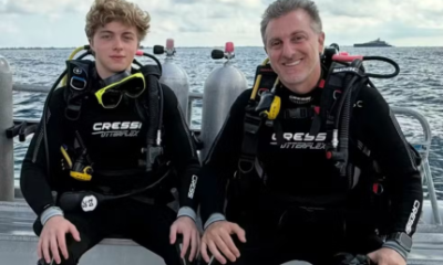 Luciano Huck e Benicio mergulham com tubaroes e Angelica reage