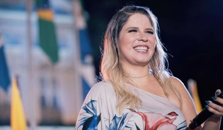 Foto de Marilia Mendonca ao lado de copiloto de.webp