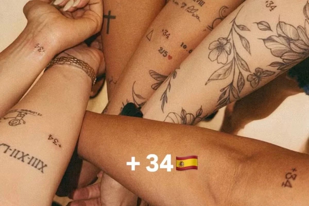 Virginia tatua codigo da Espanha com amigas e detalhe reacende