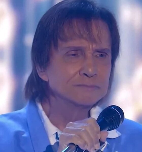 Como surgiu o costume de Roberto Carlos de jogar rosas