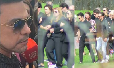 Amigos famosos viuva sendo amparada e Renner carregando o caixao